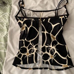 Tara Grinna black, gold, and tan tanking.